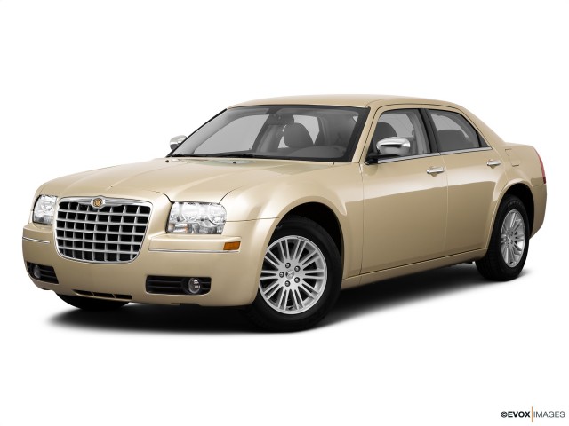 Gold 2010 Chrysler 300 Touring With White Background