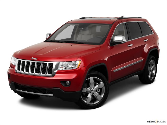 Red 2011 Jeep Grand Cherokee Overland With White Background