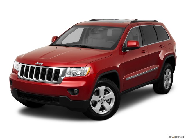 Red 2011 Jeep Grand Cherokee Laredo With White Background