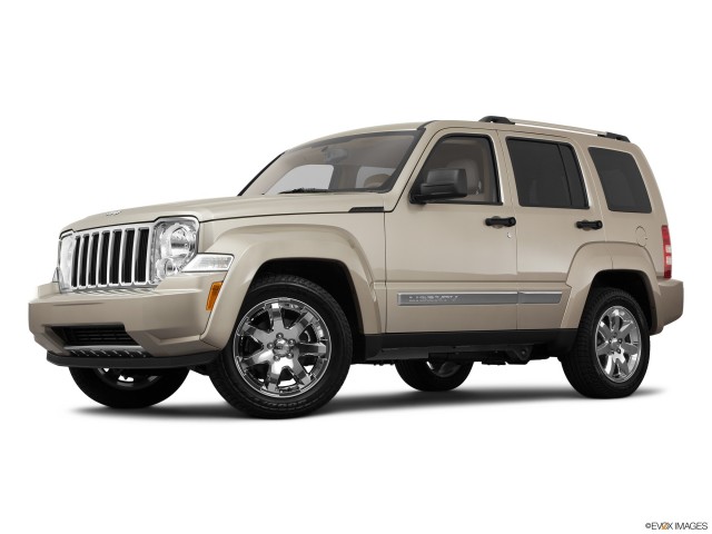 Beige 2011 Jeep Liberty With White Background