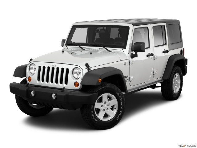 Silver 2011 Jeep Wrangler Sport With White Background