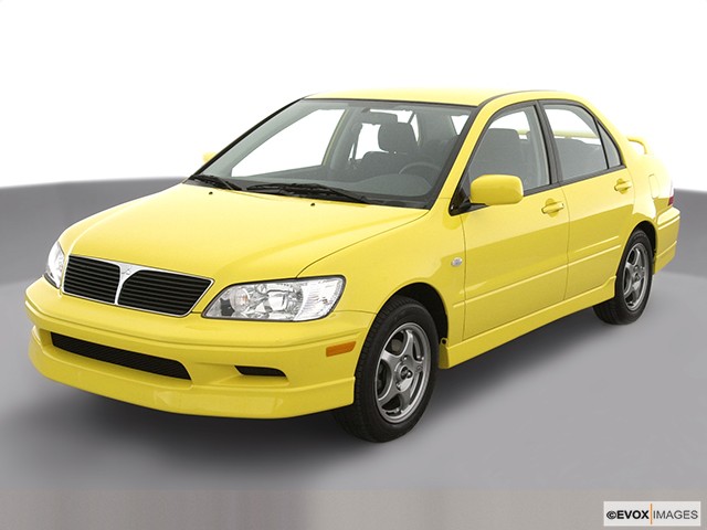 Yellow 2003 Mitsubishi Lancer Oz-Rally From Front-Driver Side