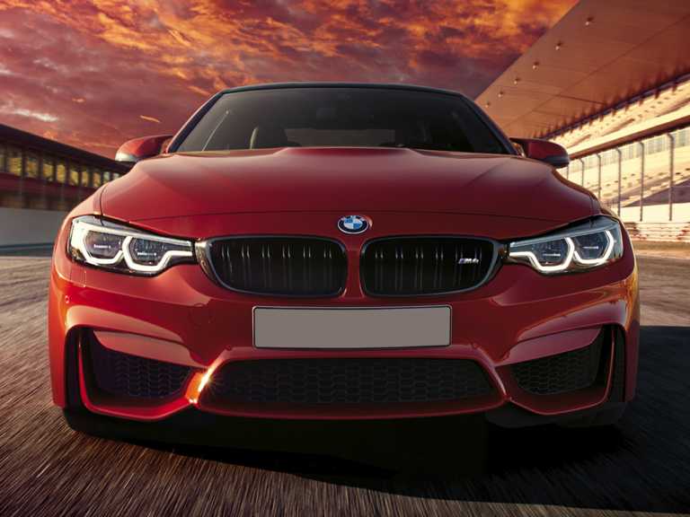 Red 2020 BMW M4 From Front Side