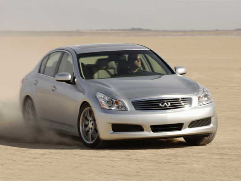 Silver 2008 Infiniti G35 Drifting In The Sand