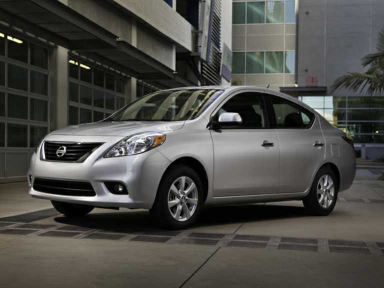 Silver Nissan versa from front drivers side