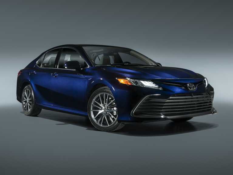 Blue 2021 Toyota Camry From Front-Passenger Side