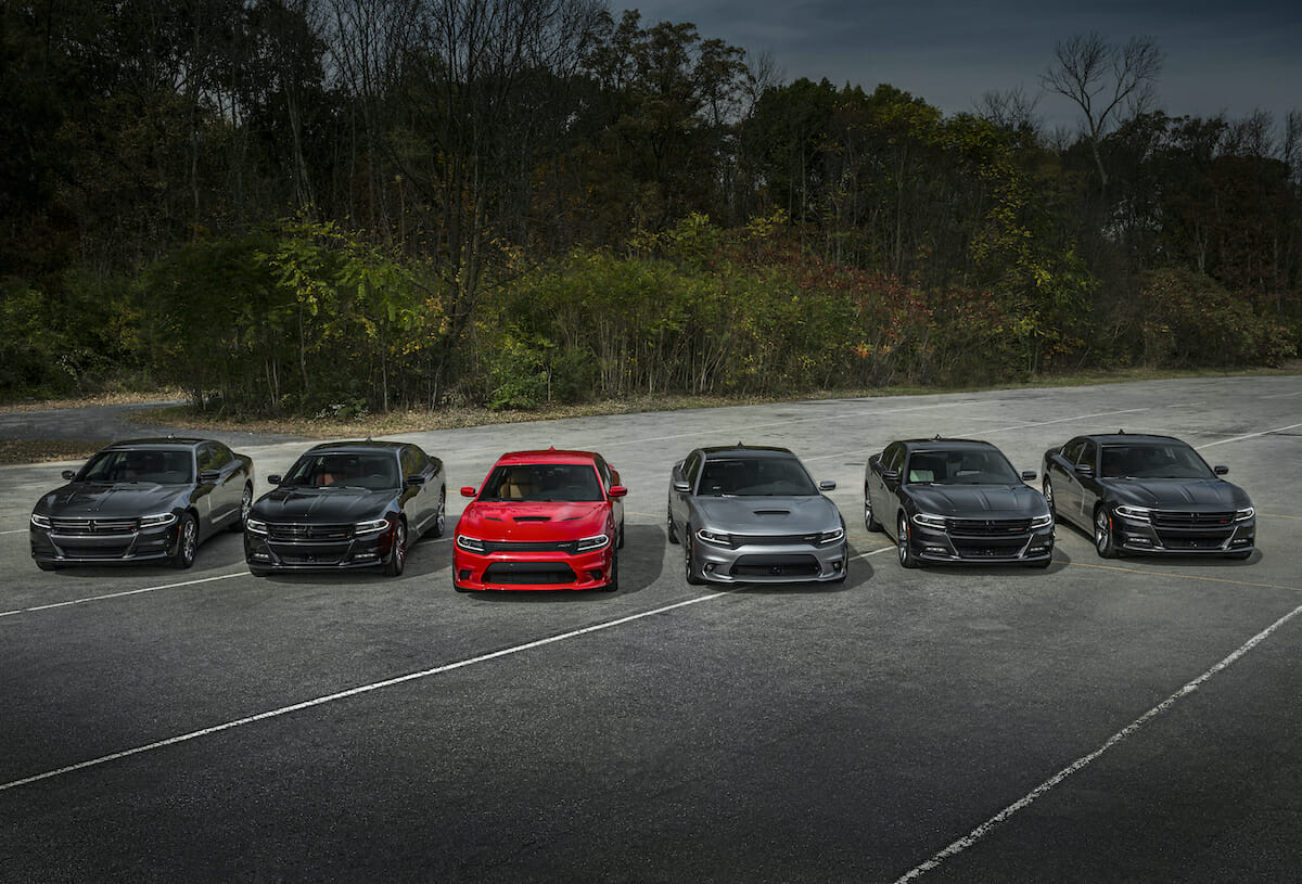 2015 Dodge Charger model lineup. From left to right: 2015 Dodge Charger SE AWD, Charger SXT AWD, Charger SRT Hellcat, Charger SRT 392, Charger R/T and Charger R/T Road & Track.