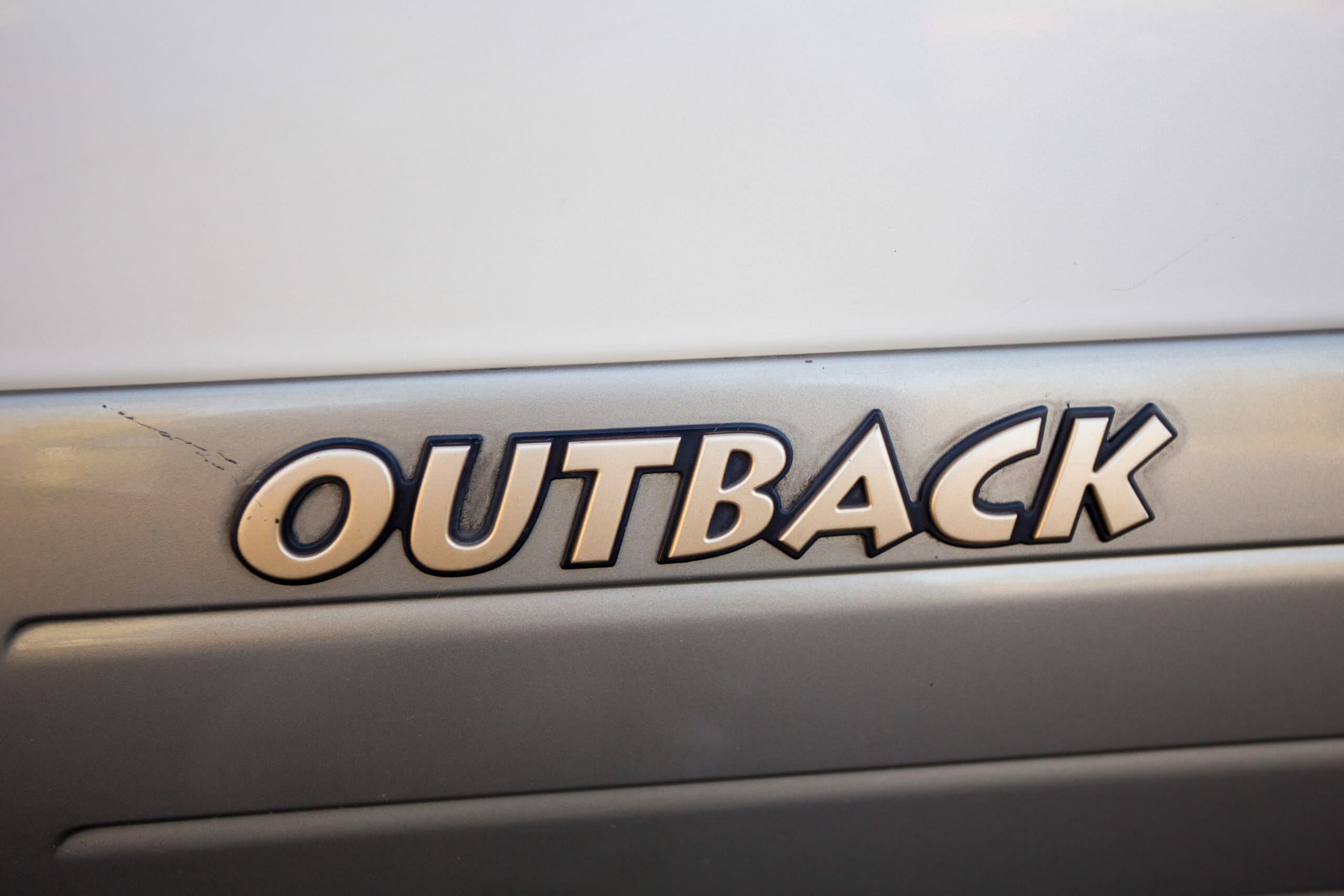 Subaru Outback logo on vehicle