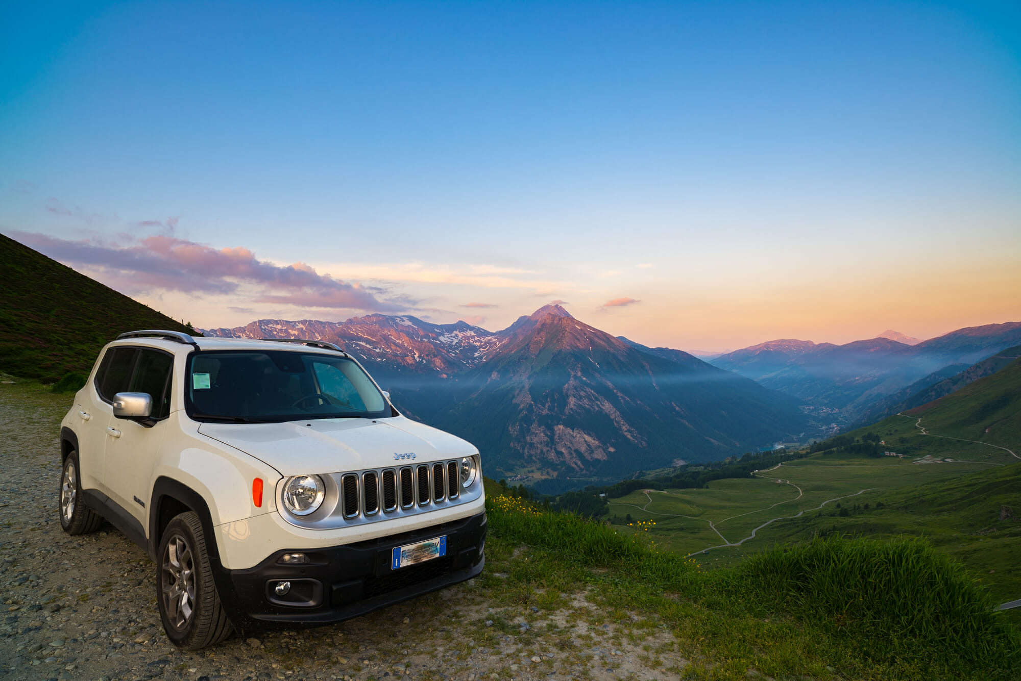 White Jeep Renegade With Mountains View