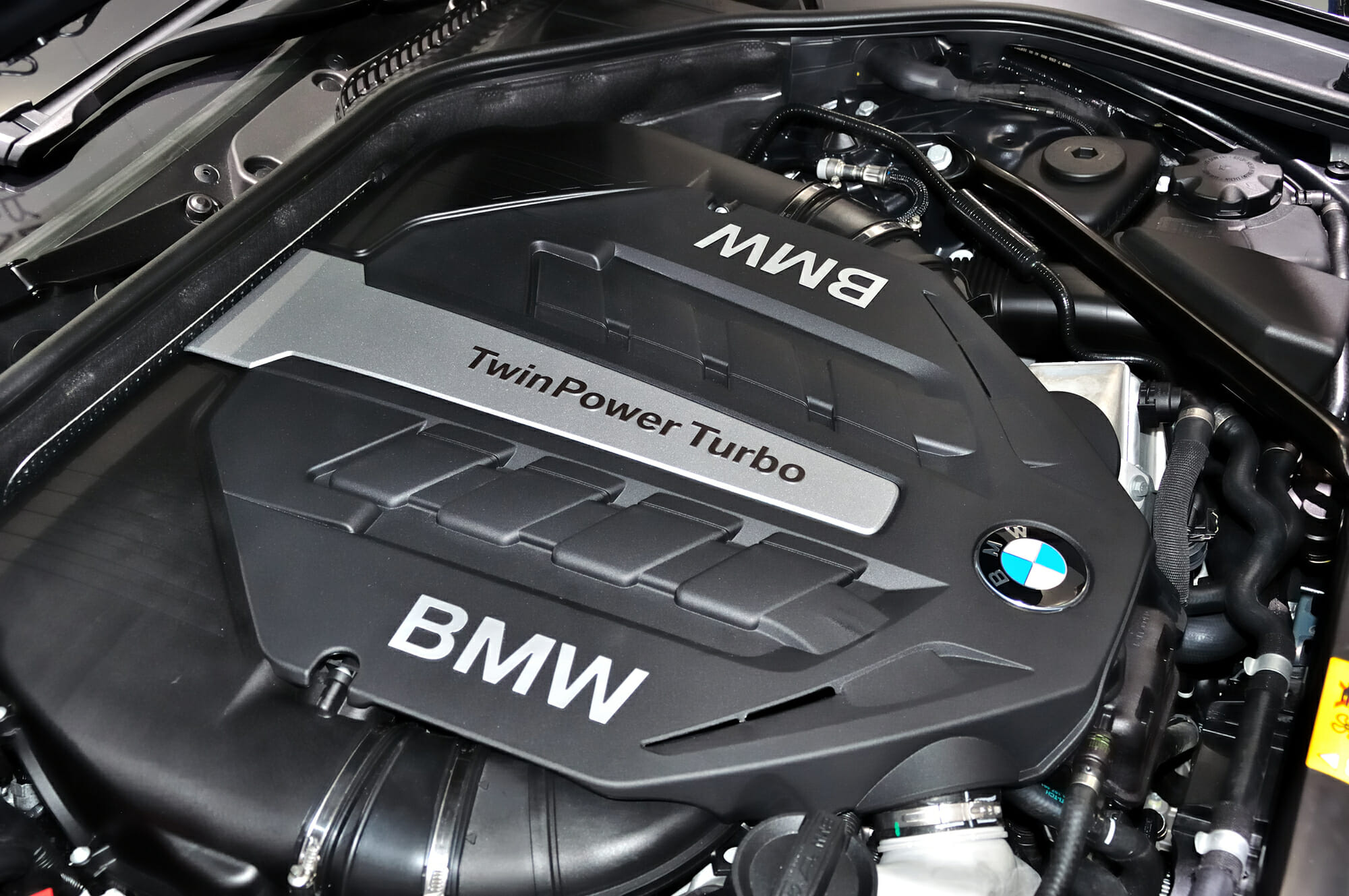 BMW Engine shown under the hood of vehicle
