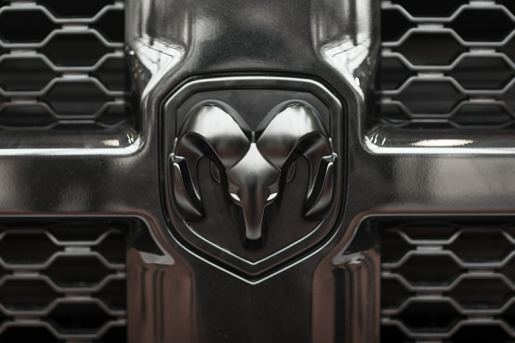 Ram logo on front grille of dodge truck 