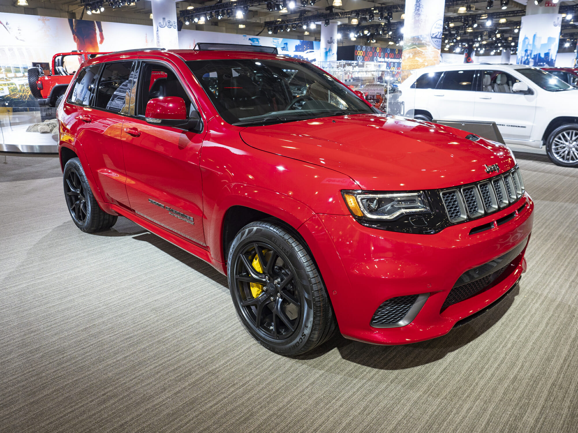 Red Jeep Trackhawk at auto show - Vehicle History
