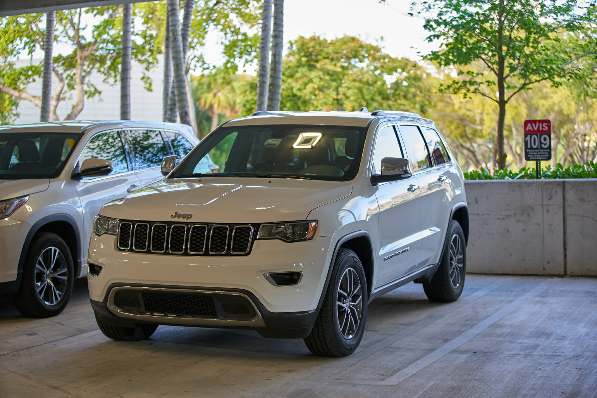 White Jeep Cherokee From Front-Driver Side
