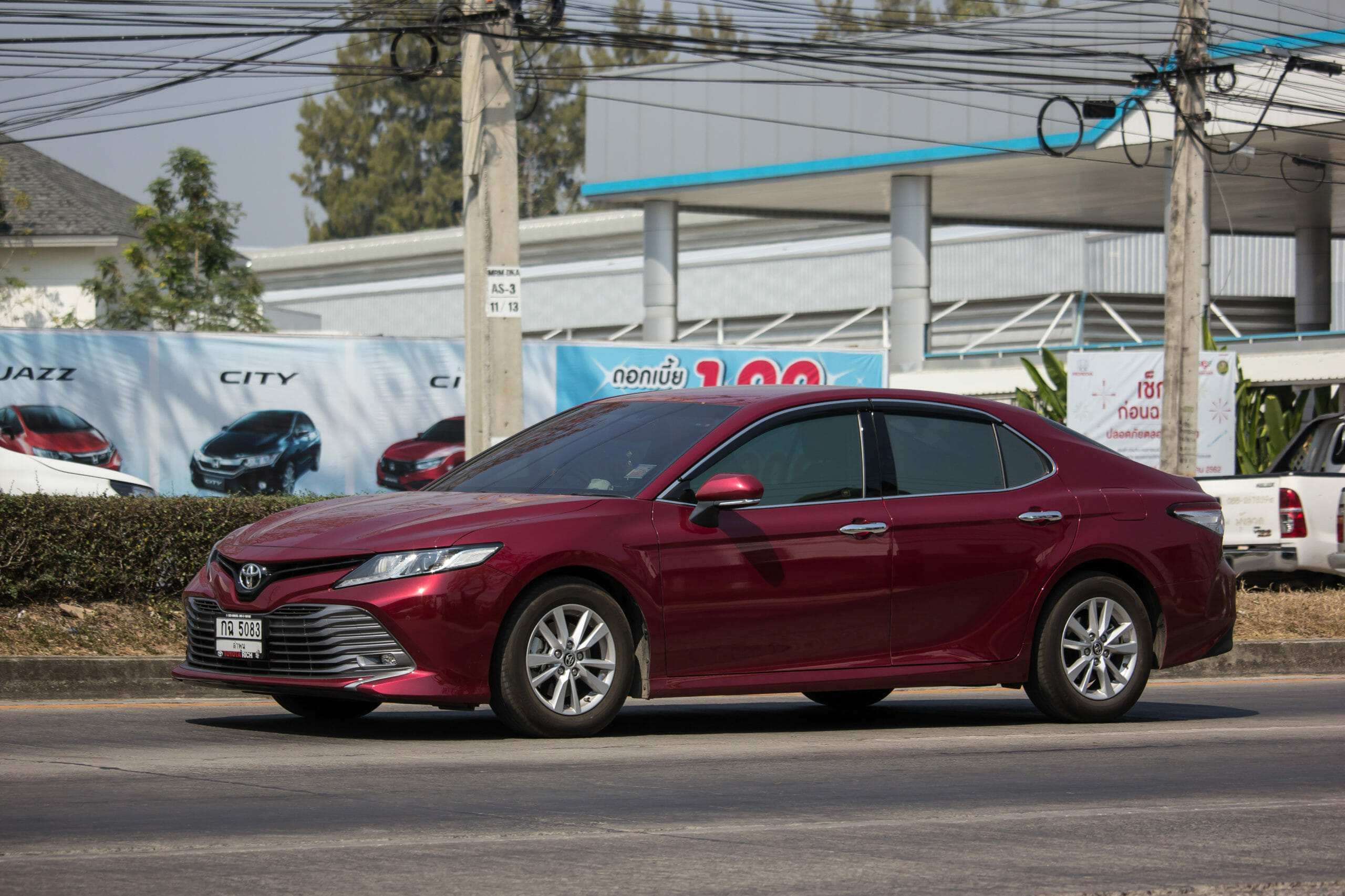 2019 Toyota Camry driving through city - Vehicle History
