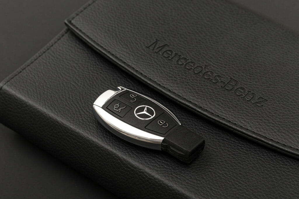 Mercedes Benz key with black leather wallet