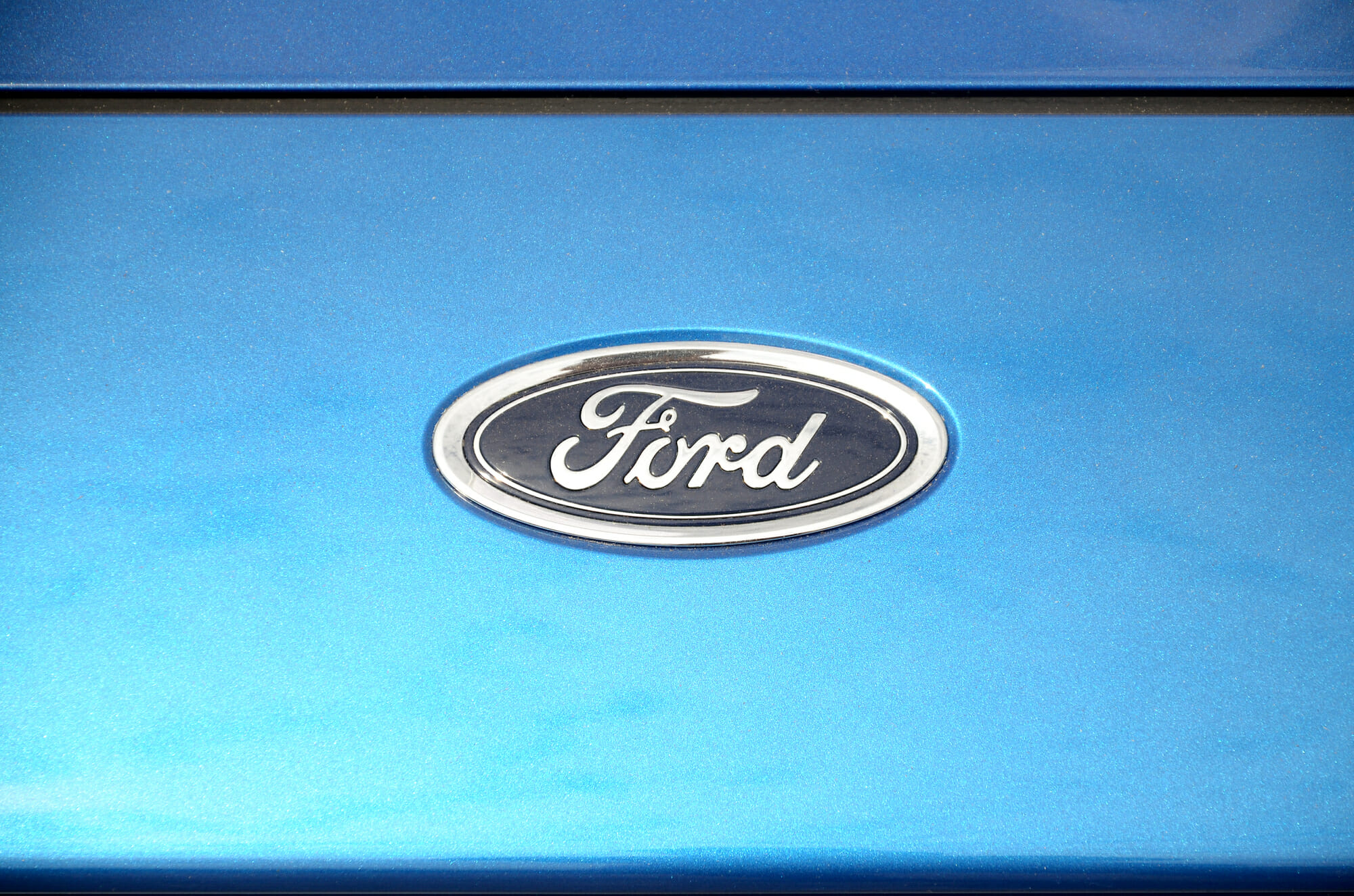 Ford Logo On Blue Car