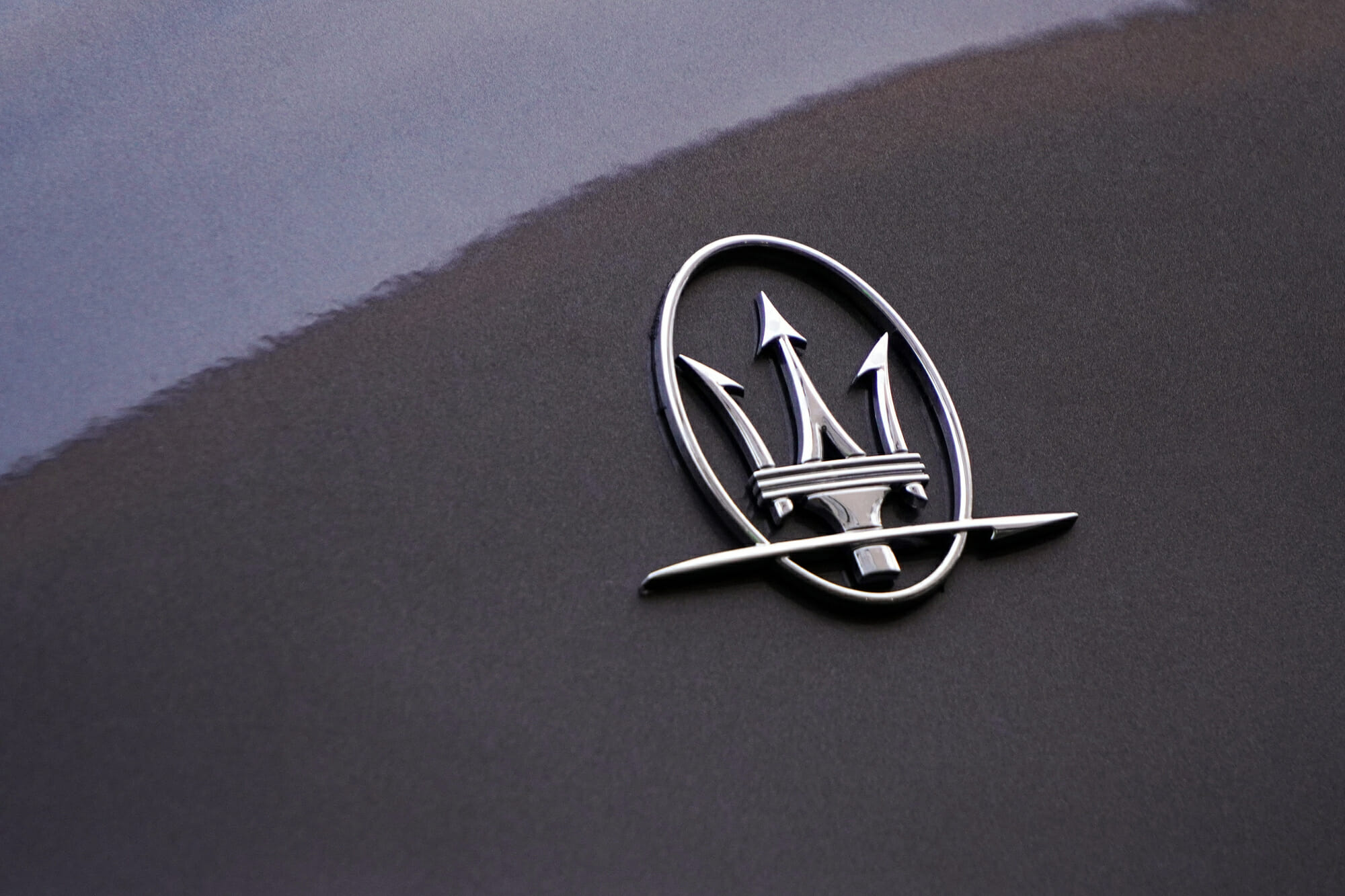 Gray Maserati Logo
