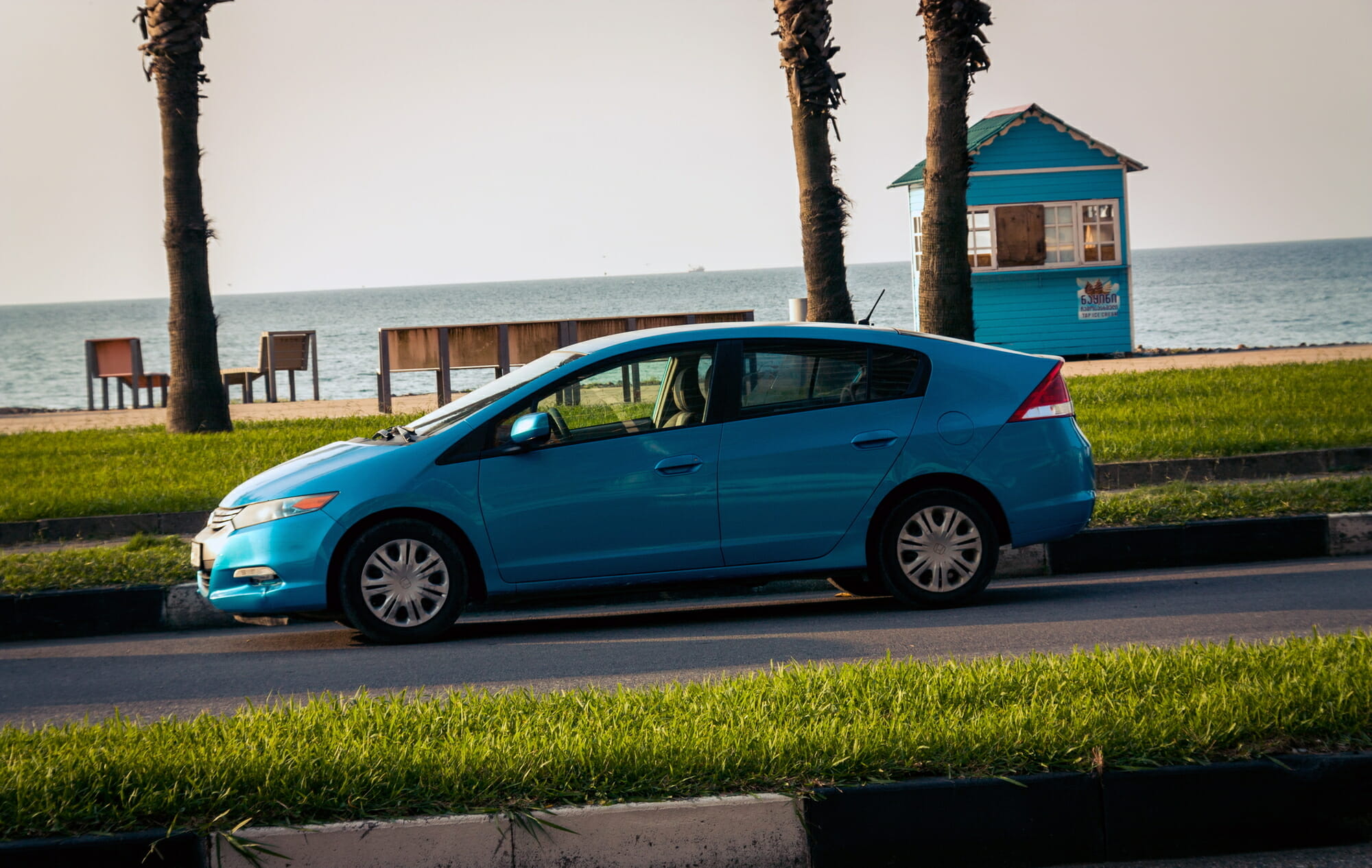 Blue Honda Insight In Motion