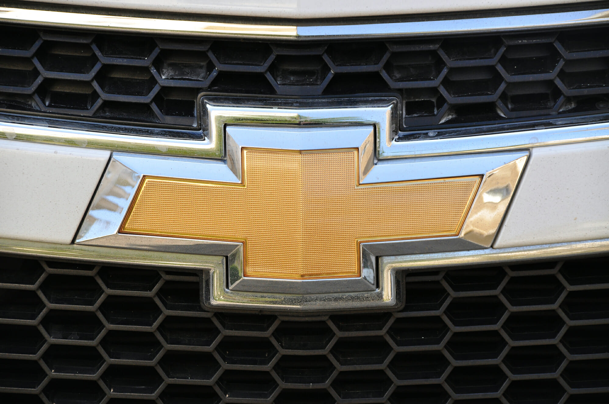 Closeup of Subaru logo on model