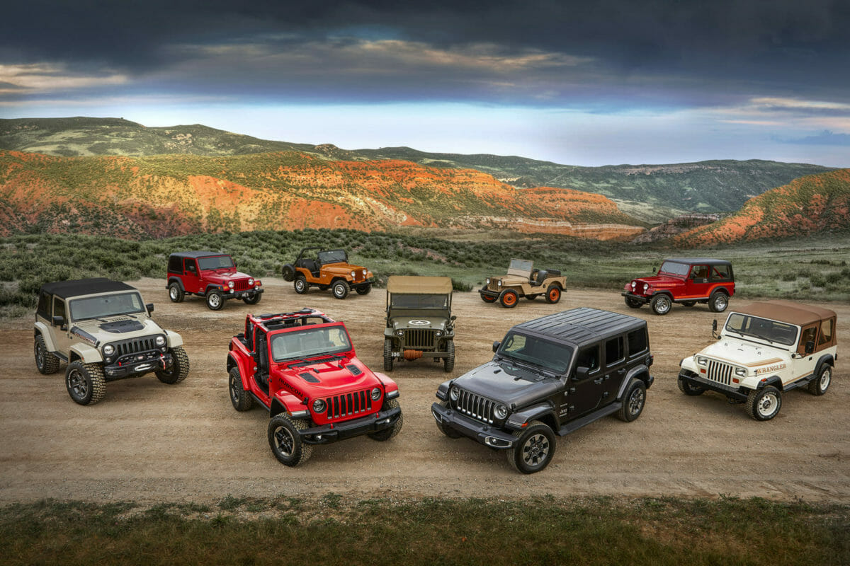 Willys Jeep with various Jeep Wranglers and CJs - Photo by Jeep